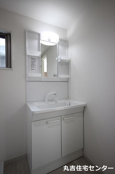 ��ʌ��z�J�s��ԑ䓌�S���ڂ̃A�p�[�g�̐��ʏ�