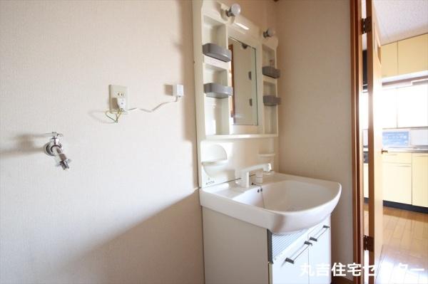 ��ʌ��z�J�s��ԑ䐼�Q���ڂ̃A�p�[�g�̐��ʏ�